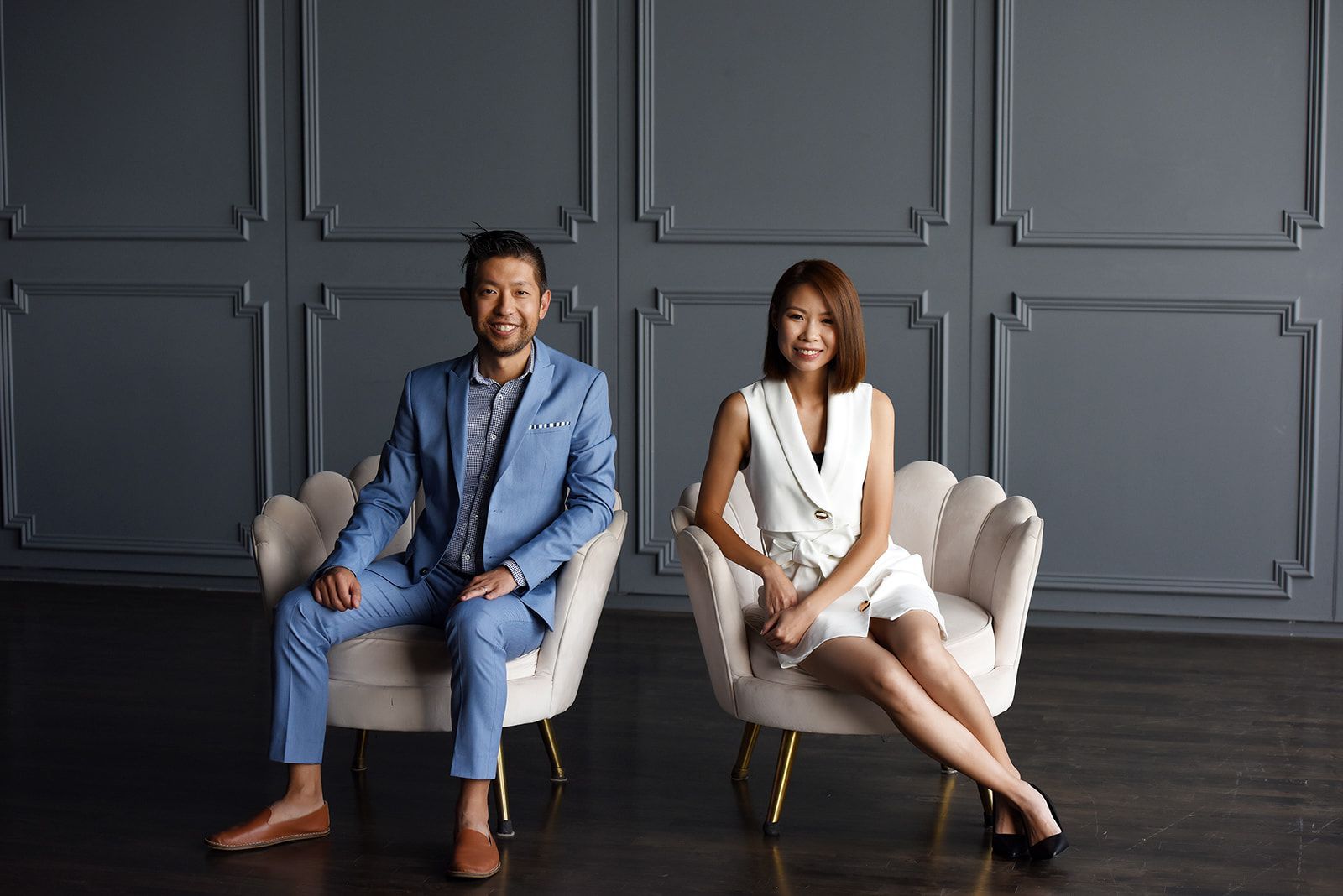 Kirby Chan with a member of the Kirby Chan & Co. Real Estate Team